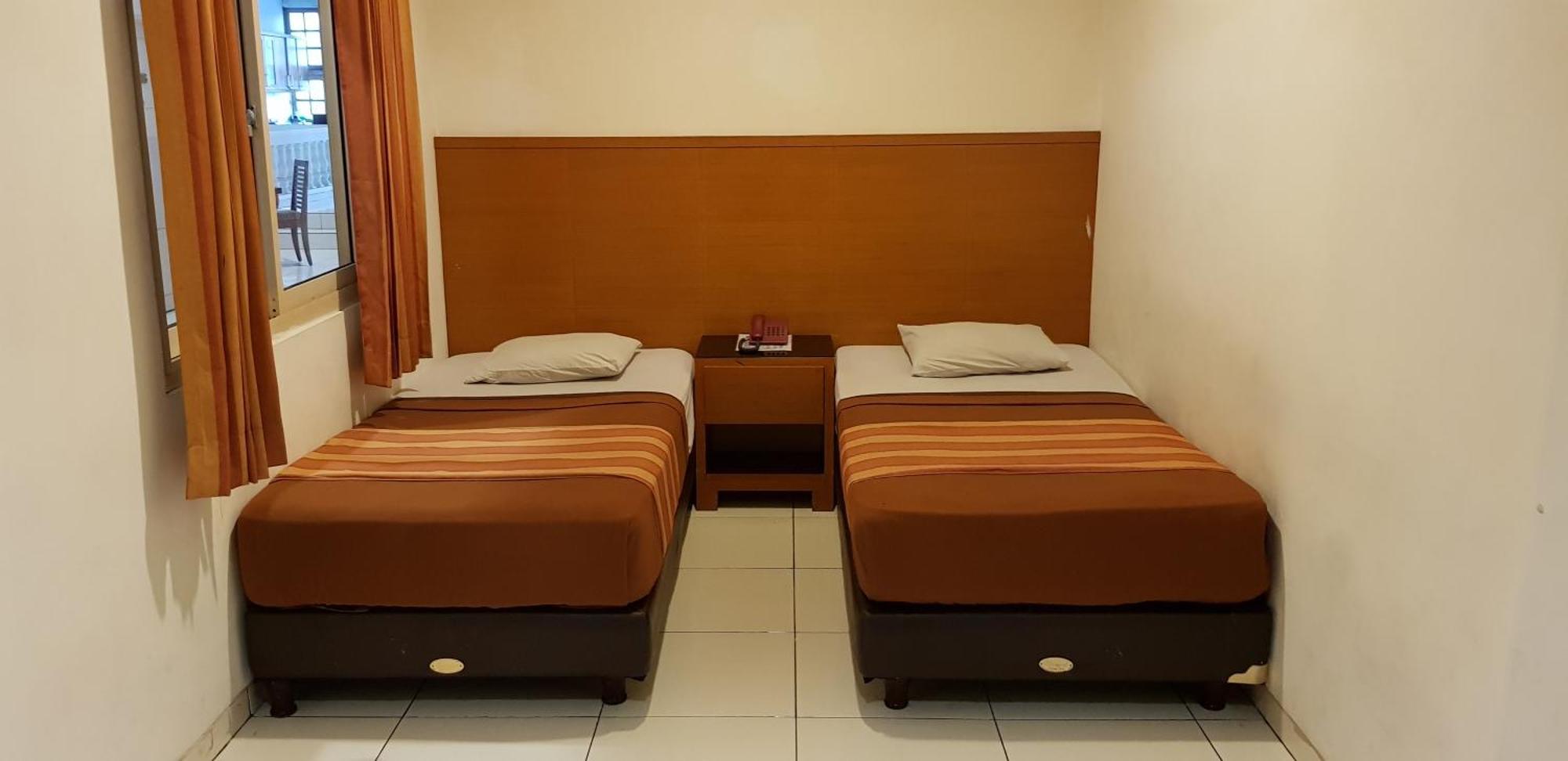 Hotel Dequr Jakarta Kota Номер фото