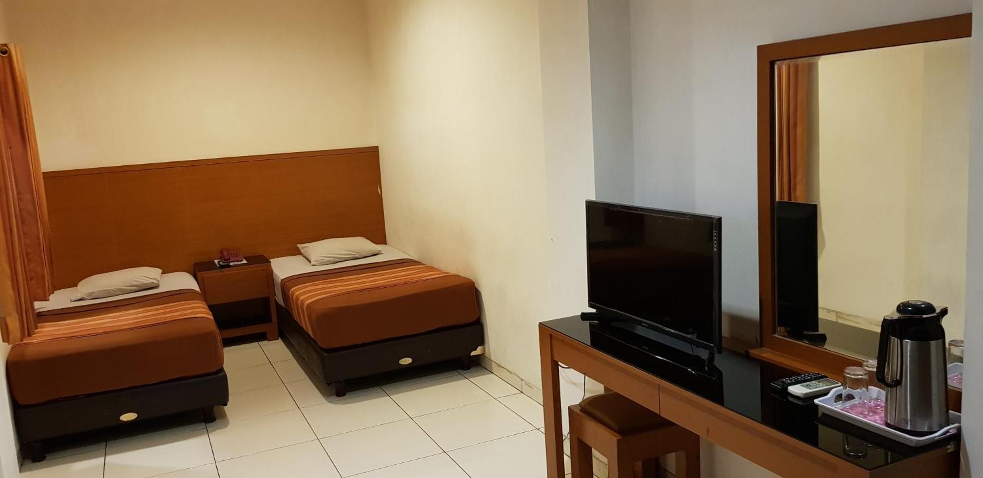 Hotel Dequr Jakarta Kota Номер фото